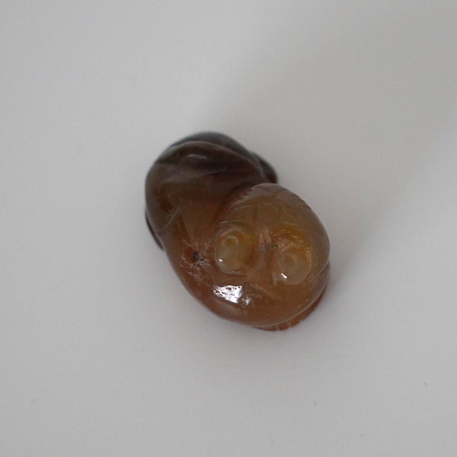 石製回頭猫茶枕左 ④　